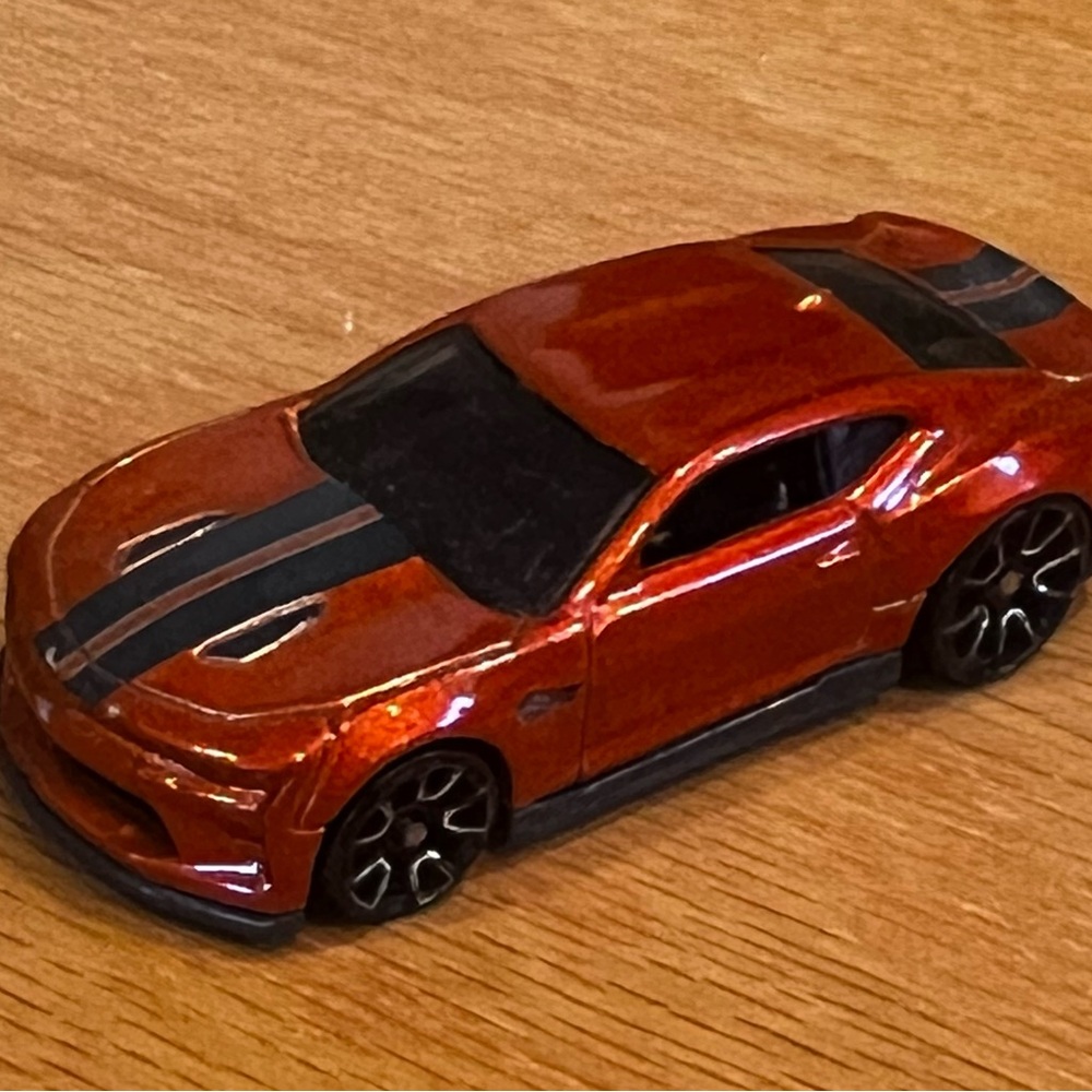 Vibrant Orange Toy Car with Black Accents